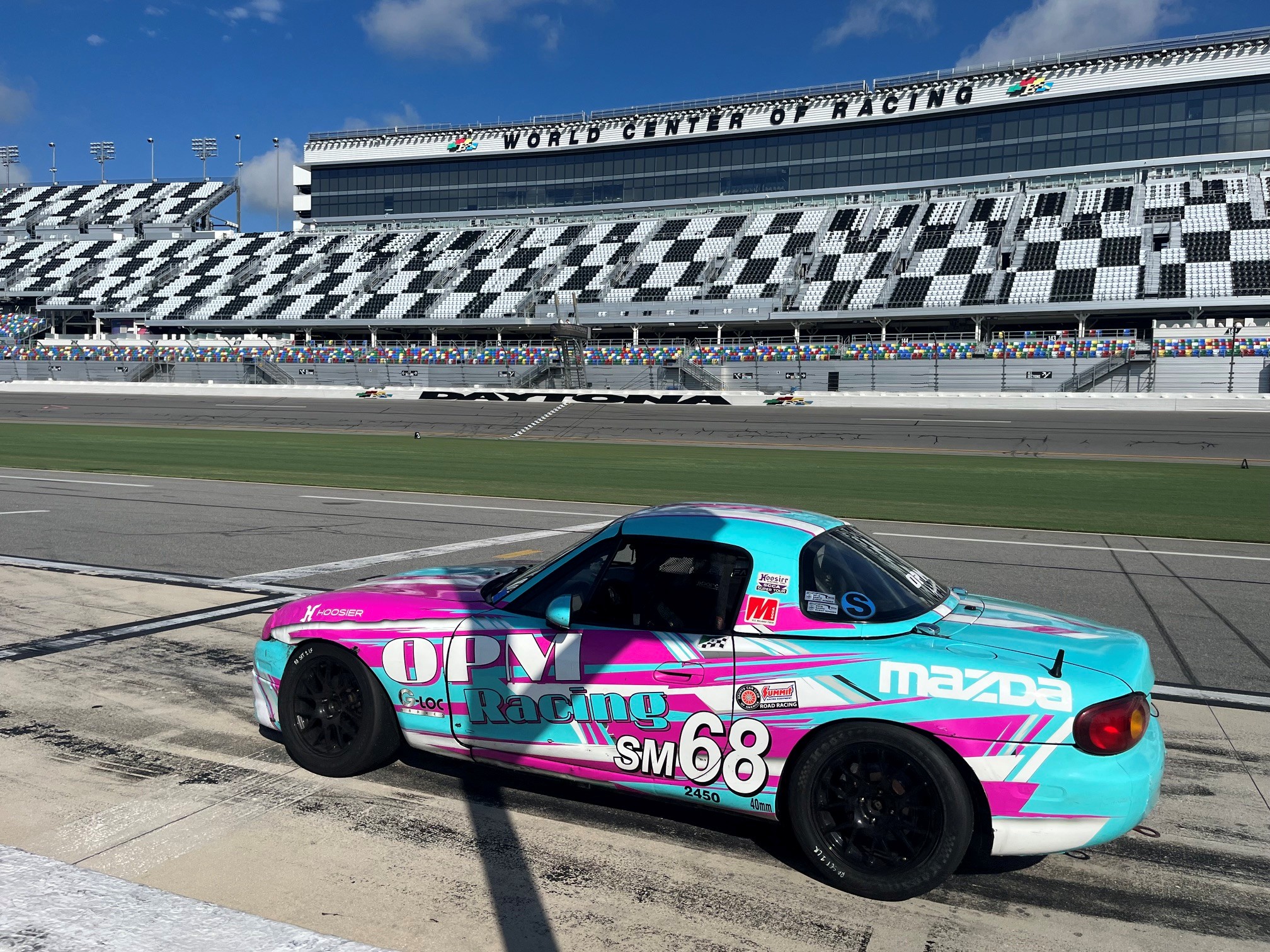 The No. 68 OPM Racing Spec Miata on pit lane at Daytona International Speedway